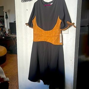 Shelby and Palmer size 14 brand new dress.black and brown. Size runs right.